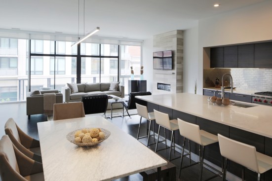 Light travels through the apartments in this infill building.