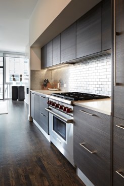 Sliding glass doors help light travel through the space.