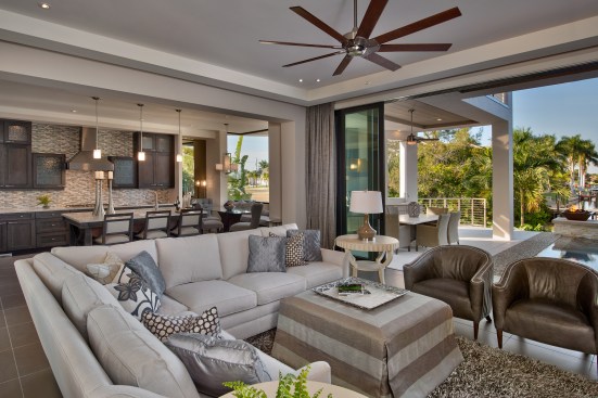 Living spaces circle around the great room and flow to the outdoors.