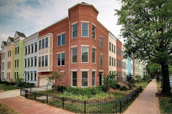 Grand, Multi-Family Housing Project - 30 to 60 du/acre (For Sale or Rent). Builder: EYA. Architect: Lessard Design.

Within walking distance of public transportation and shopping, these Washington, D.C., townhomes have rooftop terraces, bay windows and vibrant paint schemes. They fit right in with the neighborhood's 19th and early-20th century townhouses.