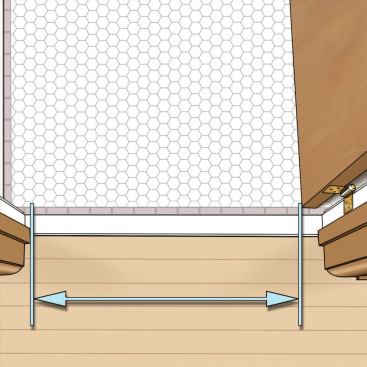 A Space-Eating Door 

A partition wall on the hinge side of the existing door limited its swing, reducing the usable width of the opening by nearly 2 inches. Given the tight project budget, moving the partition and reframing the opening to provide more clearance was out of the question.