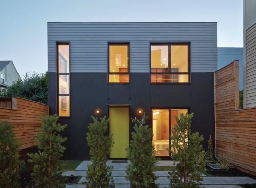 Both houses are approximately the same square footage and face the shared yard. 