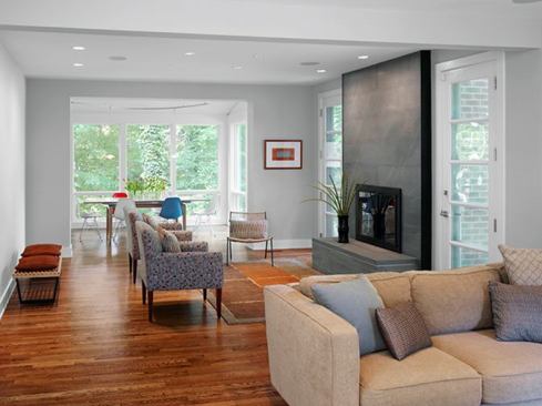 Before the house was renovated, living spaces were closed off from the rest of the house. Now, there's flow throughout.