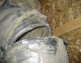 Leaky ducts create problems with backdrafting and lead to heat loss. (Photo: Ryan Meres)