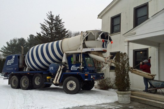 In the Northeast and other cold-weather climates, construction doesn’t stop in the winter. However, seasonal
adjustments often have to be made and one of these involves the way concrete is
mixed.&nbsp;