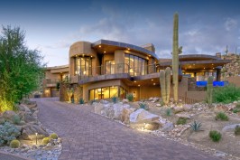 FRONT ELEVATION
Set into rising canyon landscape, multiple rooflines help blend the home into nature.