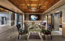 Ground floor meeting room with reclaimed bank vault conference table.
