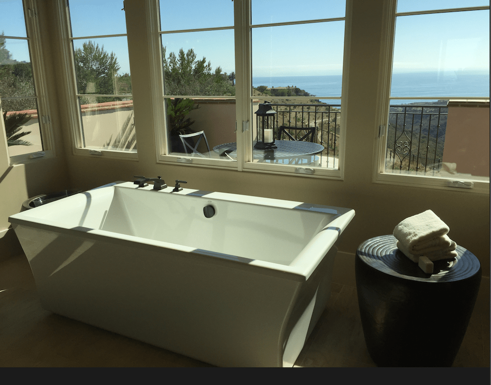"Her" master-bath in one of The New Home Company's Coral Crest plans, overlooking Abalone Point on the Newport Coast of California.