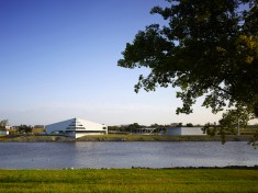 Main Building and raft building viewed from the south side of the Oklahoma River
