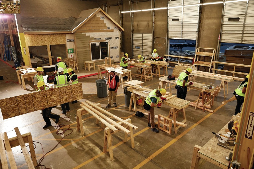 Students learn the details of constructing a home from instructors at the Colorado Home Building Academy.