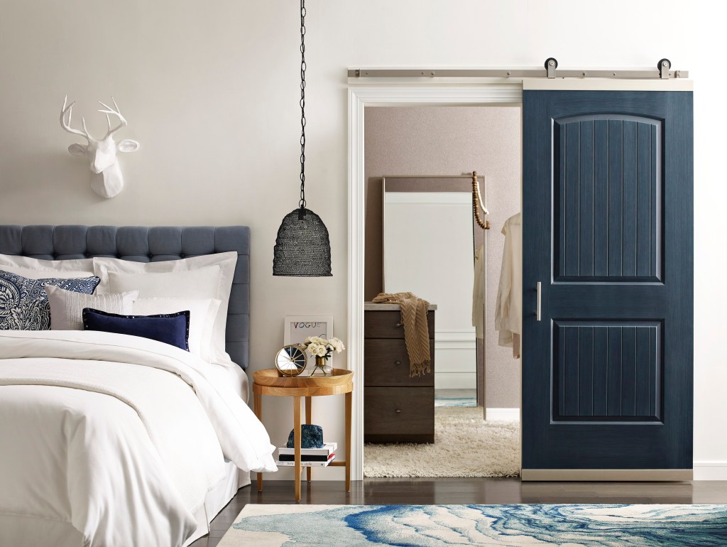 The patent-pending DesignGlide Barn Door system by Jeld-Wen can be used to convert a new or salvaged door into a sliding barn door in just a few steps.