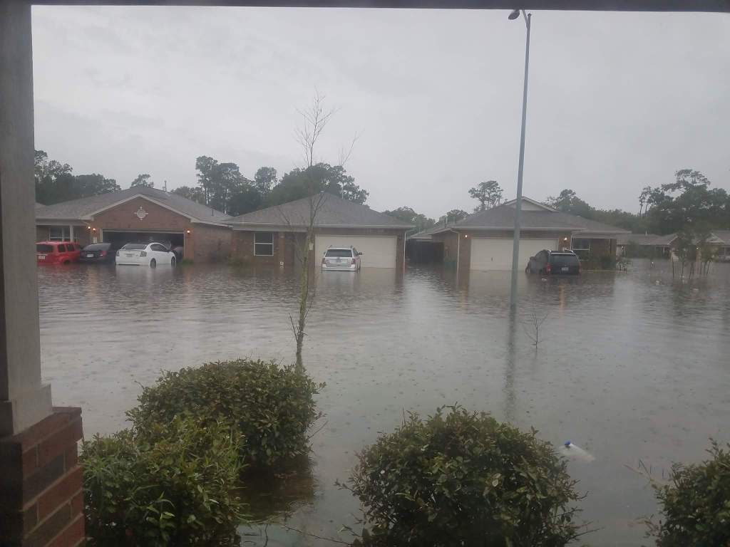 Rain continues to pour in flooded parts of Houston.