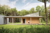 The home’s rural modern look comes from its clean lines and simple structural shapes.
