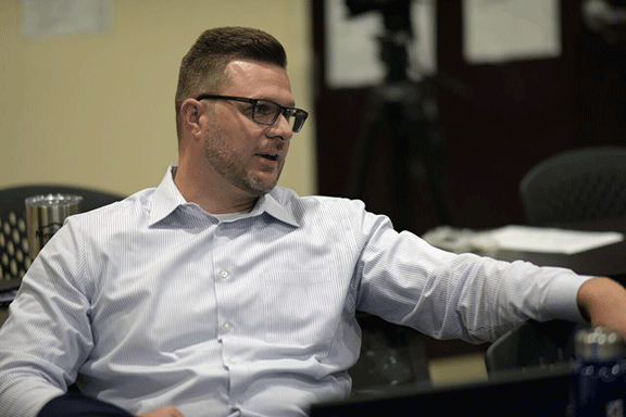 Thaddeus Lynch, Meritage Homes, discusses details of the reNEWable Living Home during a design meeting.