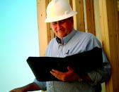 KEEPING TRACK: Village Homes senior safety manager Robert Fast knows “to the penny” how much an injury costs the company. The builder uses a designated medical clinic for all jobsite injuries, which helps pinpoint which trades and activities are prone to accidents.