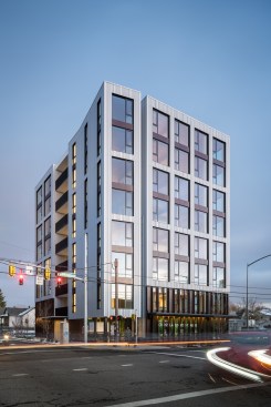 Carbon12, an eight-story condominium tower in Portland, Ore., features retail space, underground parking, and 14 residential units.
