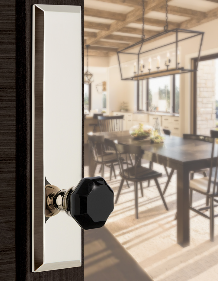 The Lyon Knob with Fifth Avenue Tall Plate in Polished Nickel.