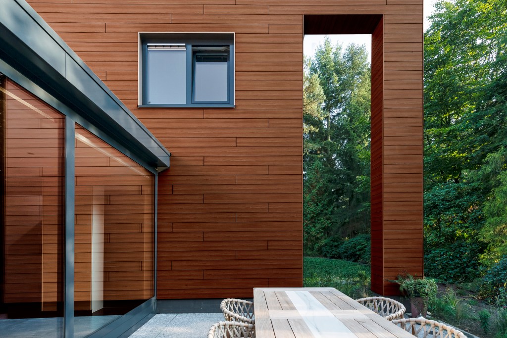 Trespa Pura NFC siding in Tropical Ipe.