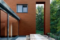 Trespa Pura NFC siding in Tropical Ipe.