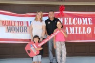 Sgt. John  Jaramillo, his wife Dania, and two young children Jazmin and John, Jr. received a new home from the Built to Honor program.