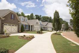 An avenue of model homes at Cresswind Charlotte by KOLTER HOMES.