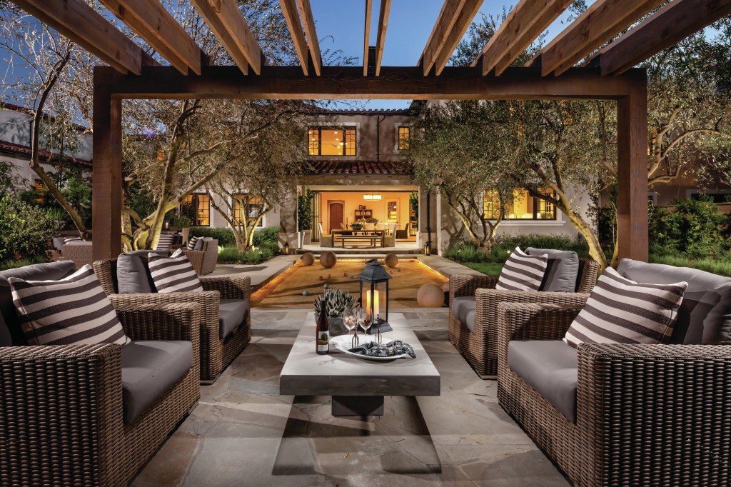 Living rooms that extend to the outdoors are important floor plan features in many areas of the country.