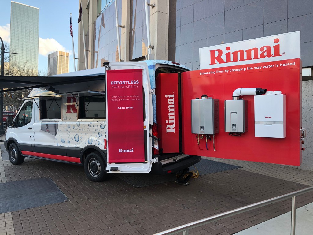 The Try Rinnai tour truck, showcasing the Sensei Tankless Water Heater, the M-Series Condensing Boiler, and the Demand Duo 80 Commercial Water Heating System.