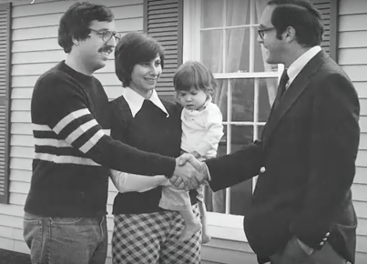 Robert Toll, right, greets new home owners in an earlier time.