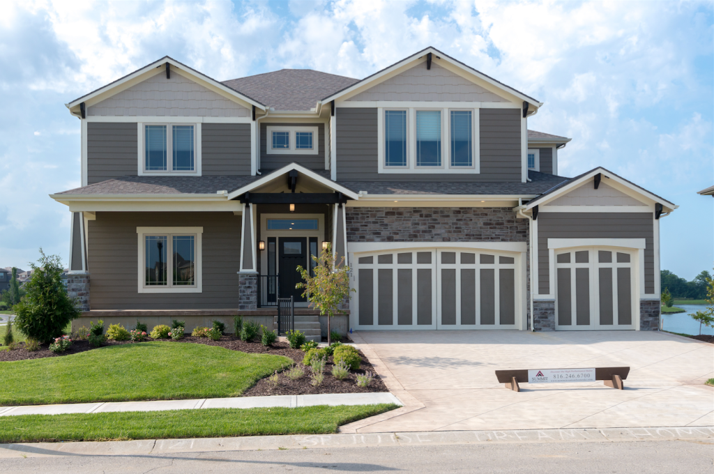 Summit Homes offers designs with three car garages in Kansas City, Mo.