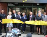 From left: Poncho Eddie, Amie Milano, Brett Dibkey, Joe Liotine, Mayor Rahm Emanuel, Jeff Fettig, Chelsey Lindstrom, Sam Abdelnour, and Rob Sundy at the ribbon-cutting ceremony for the Experience Center at World of Whirlpool in Chicago, Illinois.