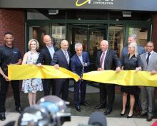 From left: Poncho Eddie, Amie Milano, Brett Dibkey, Joe Liotine, Mayor Rahm Emanuel, Jeff Fettig, Chelsey Lindstrom, Sam Abdelnour, and Rob Sundy at the ribbon-cutting ceremony for the Experience Center at World of Whirlpool in Chicago, Illinois.