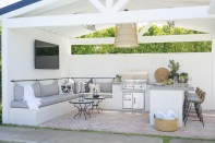 Napa Meets Newport: Molly Wood Garden Design and Christiano Homes chose a light color palette for this Newport Beach, Calif., home’s landscape design.