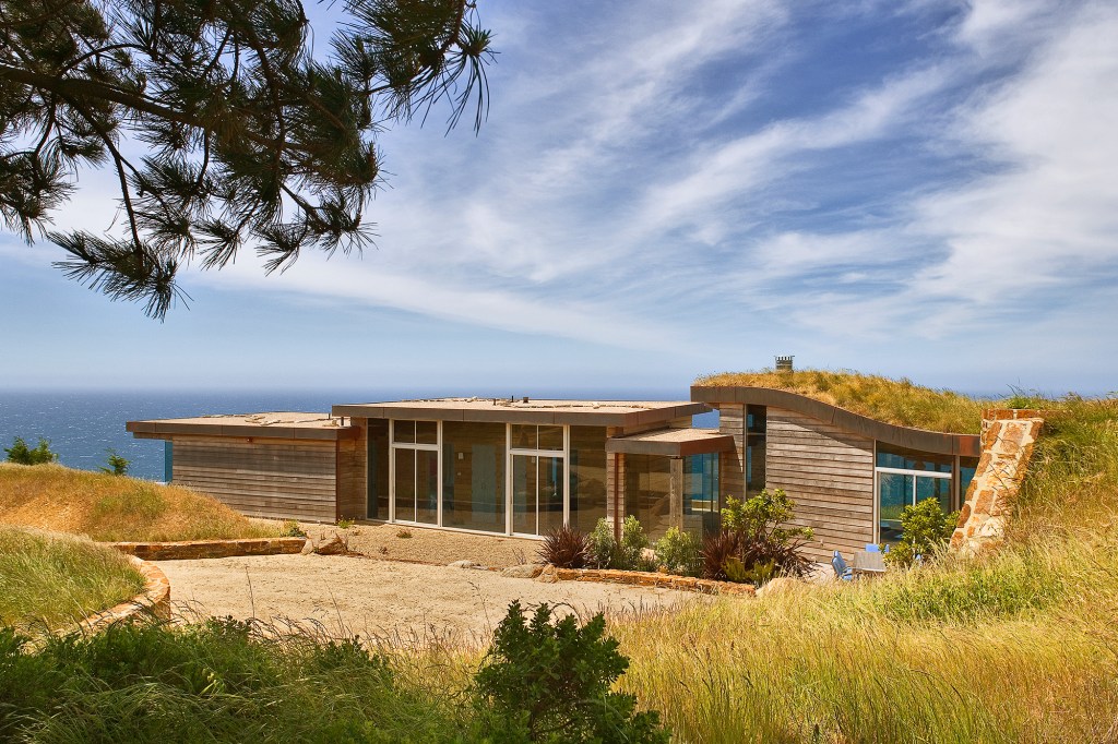 Dani Ridge in Big Sur, California, designed by Studio Schicketanz with mechanical engineering design from Monterey Energy Group, combines passive solar design with a propane boiler used for radiant heating.