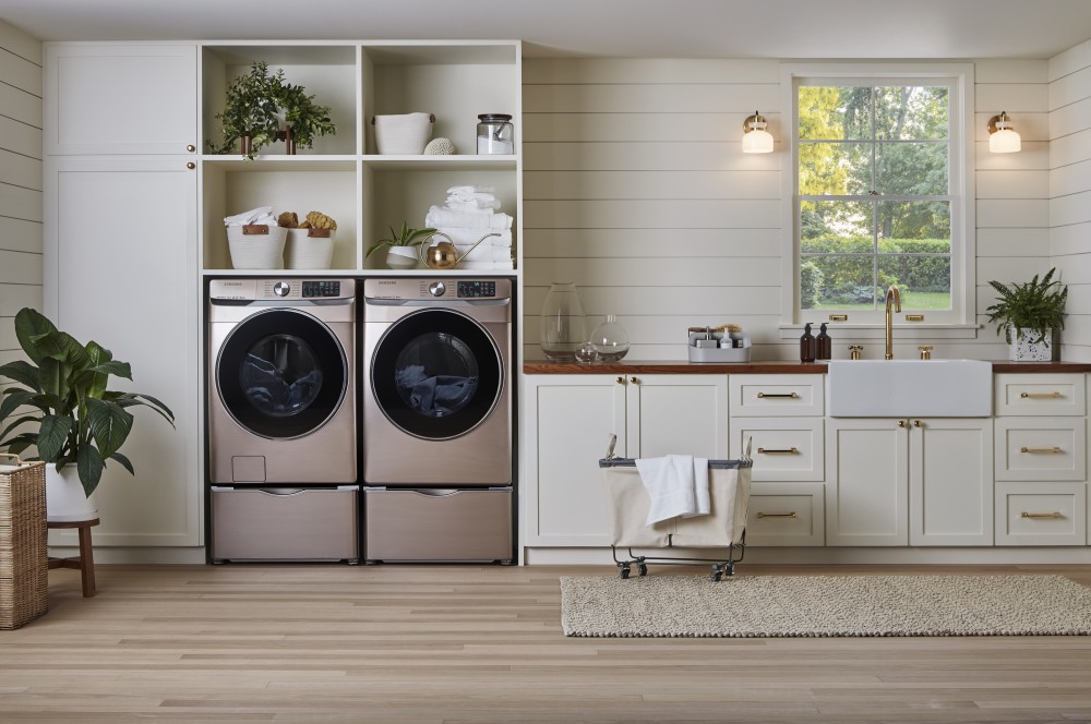 The Samsung WF6300 front-load washer and matching DV6300 dryer, shown here in Champagne Stainless Steel.