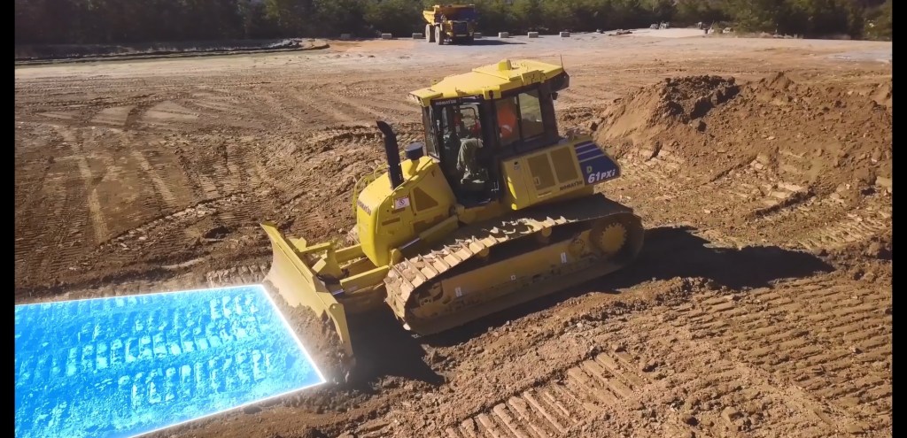 A Komatsu bulldozer equipped with Proactive Dozing Control logic.