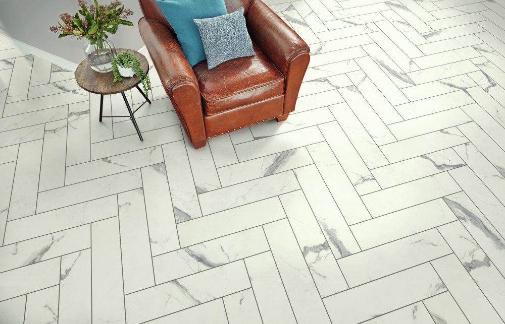 The Korlock Select system by Karndean Designflooring, shown here in Palazzo Marble’s herringbone arrangement.