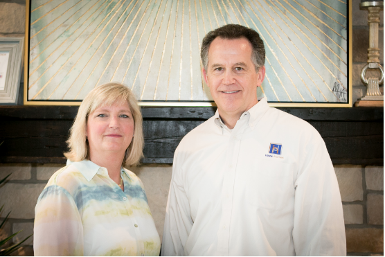 Kim Hibbs with his wife and partner, Jan.