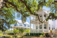 Architect Julia Starr Sanford mitigated the required flood plain height by raising the plateau by 3 feet and creating small pocket gardens.