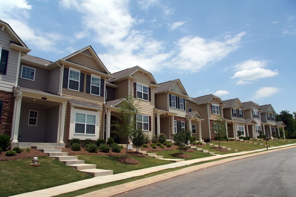 A row of new townhouses or condominiums.