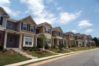 A row of new townhouses or condominiums.