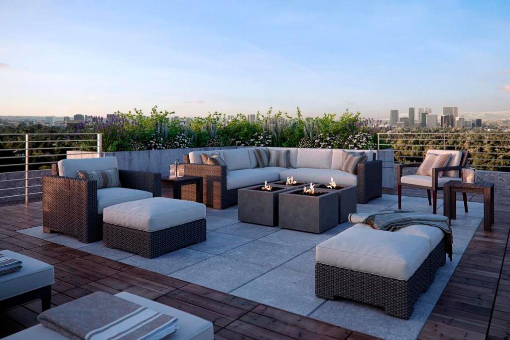 Airy Rooftop Gathering Space featuring Bloc Fire Bowl in Black Sand, Honed finish