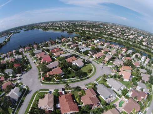 In Miami-Dade County, Fla., single-family homes closer to sea level trade at discounts to those at higher elevations.