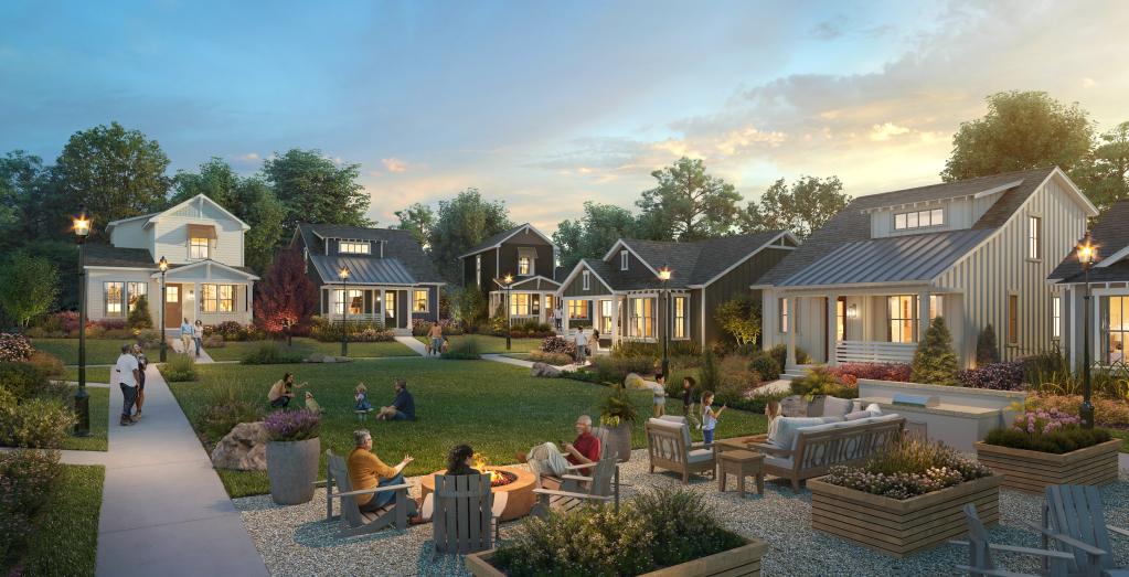 Families lounge in front of their houses in a communal-like setting.