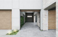 The home includes a deep one-car garage with an option for a lift, and a one-car carport that connects to the adjacent front courtyard.