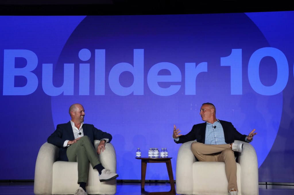 David Weekley Homes president Chris Weekley (left) and Meritage Homes CEO Phillippe Lord share insights during “The New Leadership Agenda” panel at the Builder 100 Conference.