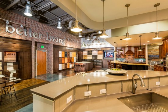This Coleman Homes design center, designed by Success Strategies, lets the builder's strong brand shine throughout the space while providing customers with access to a variety of home design options.