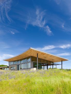 At 2,800 square feet, the Caterpillar house is modestly sized compared to other homes in the Carmel area. Its elongated east-west footprint maximizes passive solar orientation while offering a nod to its ranch-house inspiration. “A great combination of performance and style,” the jury said.