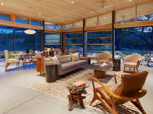 Opening glass walls provide a deep indoor-outdoor connection while promoting cross-ventilation.