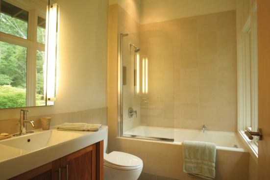 Low-flow bath fixtures include a Danze showerhead and lav faucet and a Toto dual-flush toilet.