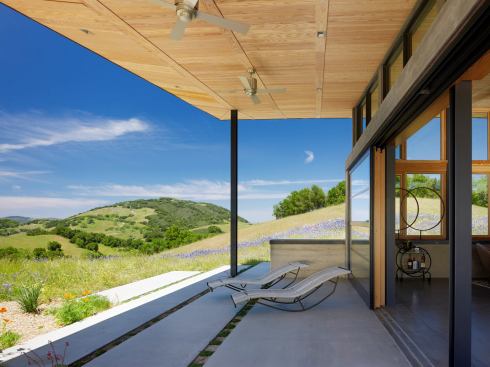 The house was built on 35% fly ash footings with FSC-certified 24-inch-o.c. wood framing.